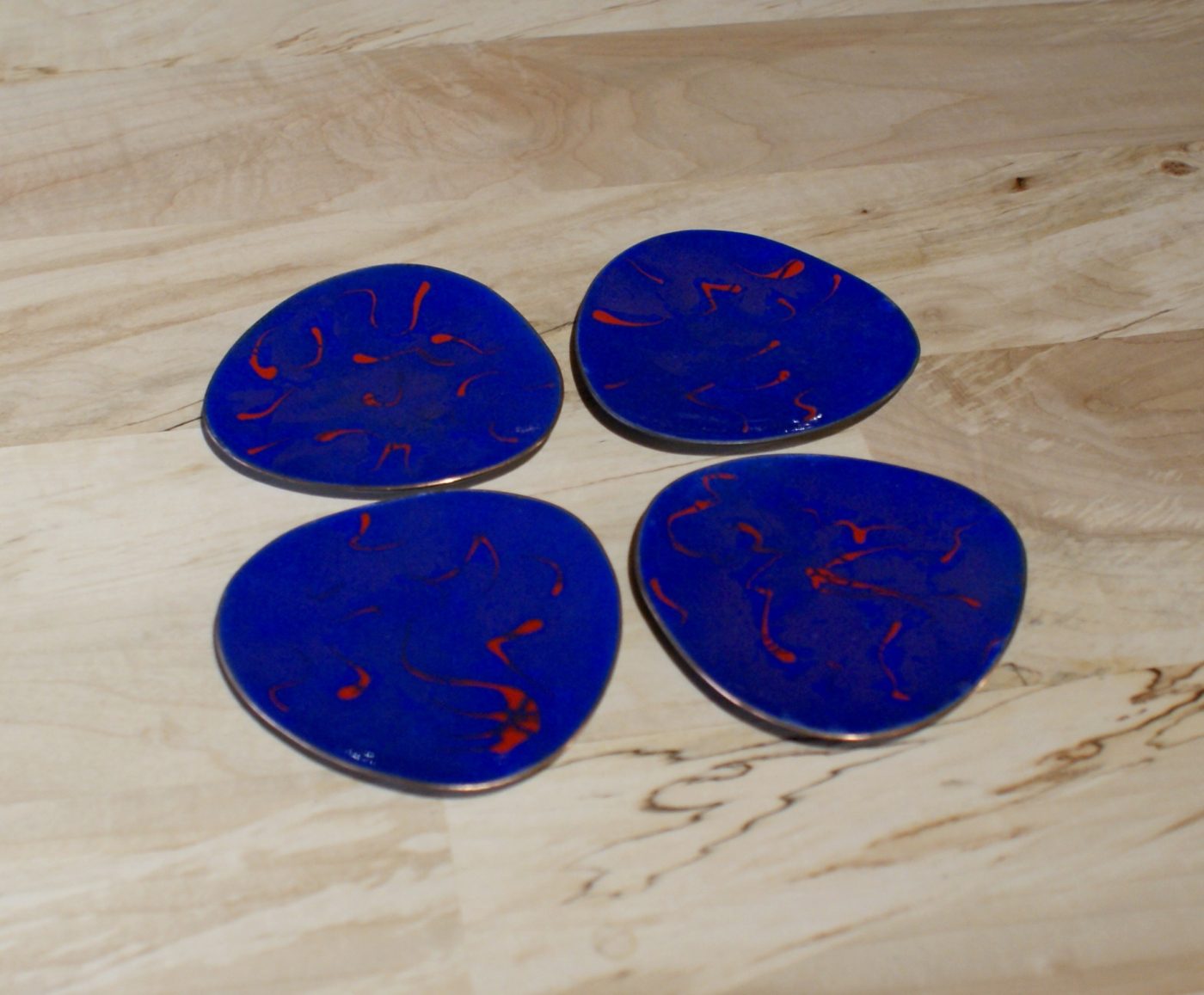 Blue and Red Enamel Coasters Signed BL Avalon set of 4