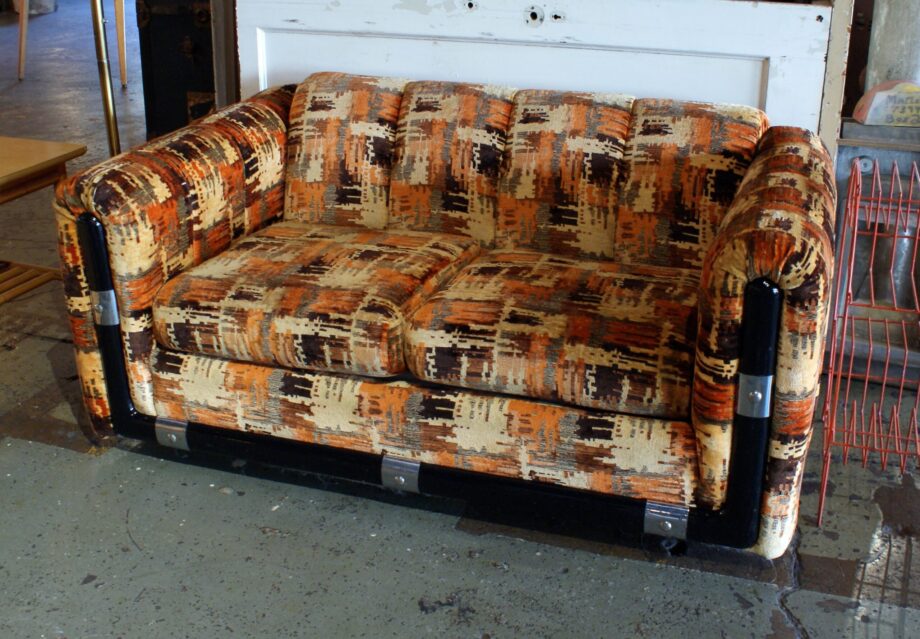 Orange Patterned 70s Loveseat w Black and Chrome Trim