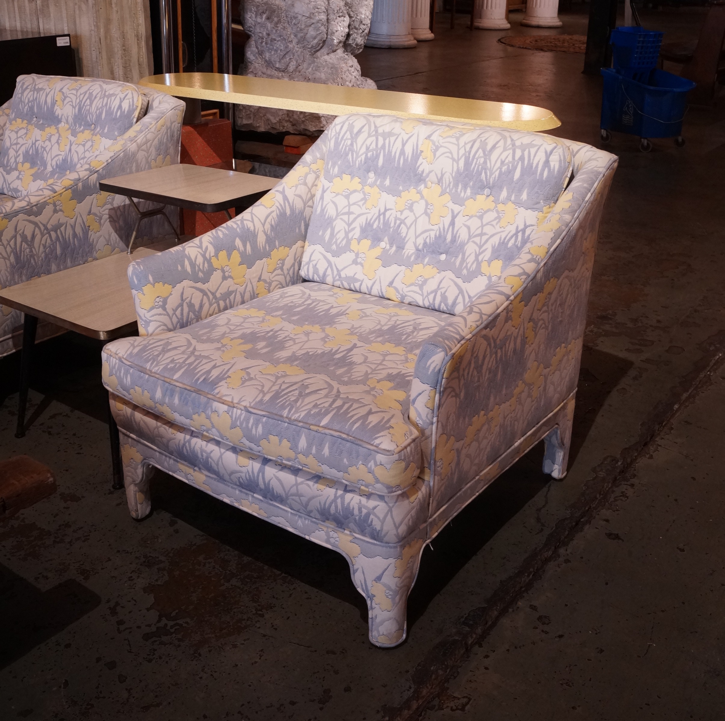 yellow patterned armchair