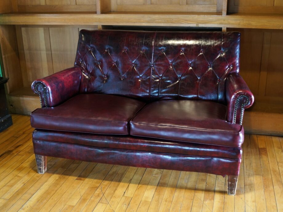 Dark Red Vinyl Loveseat w Button Back