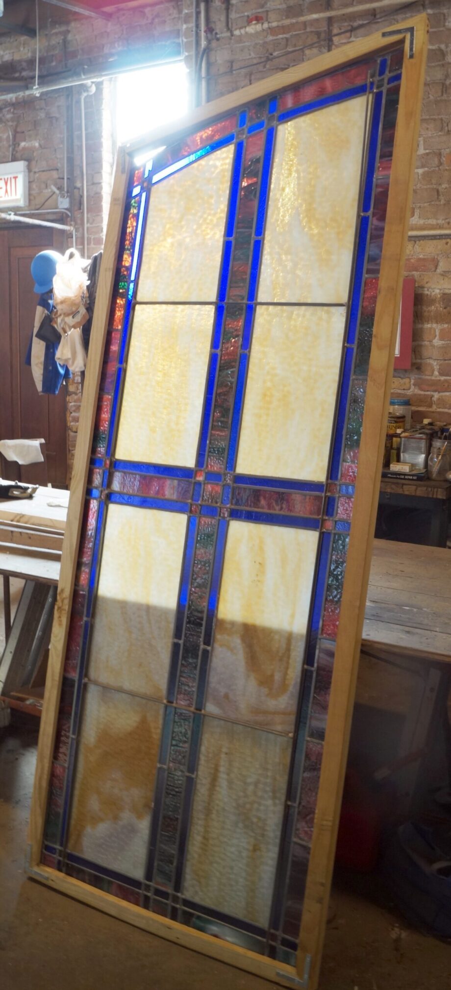 Half Arched Blue and Amber Stained Glass Panel