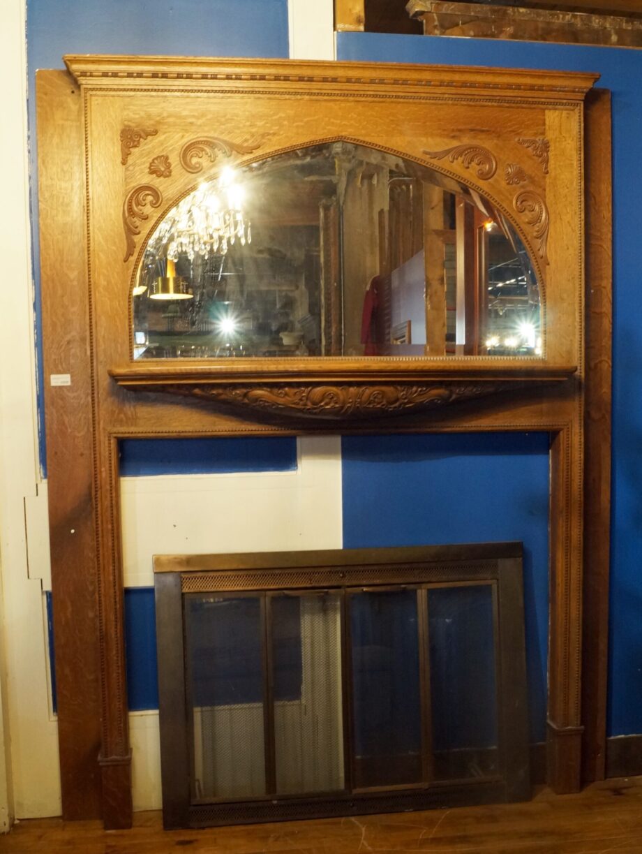 Tall Mantel w Engravings and Arched Mirror