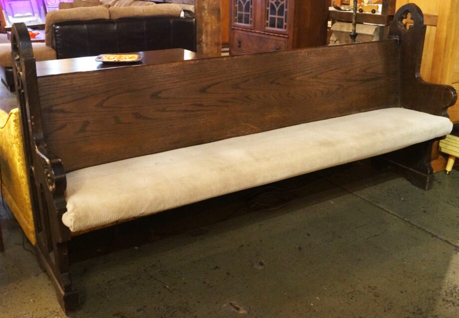 White Upholstered Dark Wood Church Pews