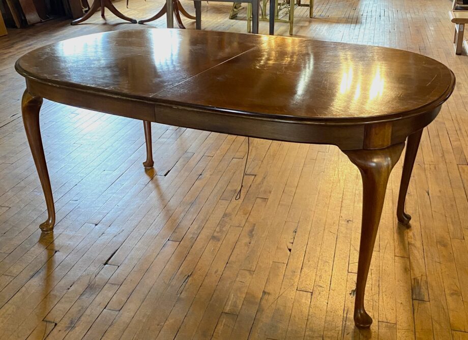 Dark Wood Oval Dining Table w Light Trim and 2 Leaves