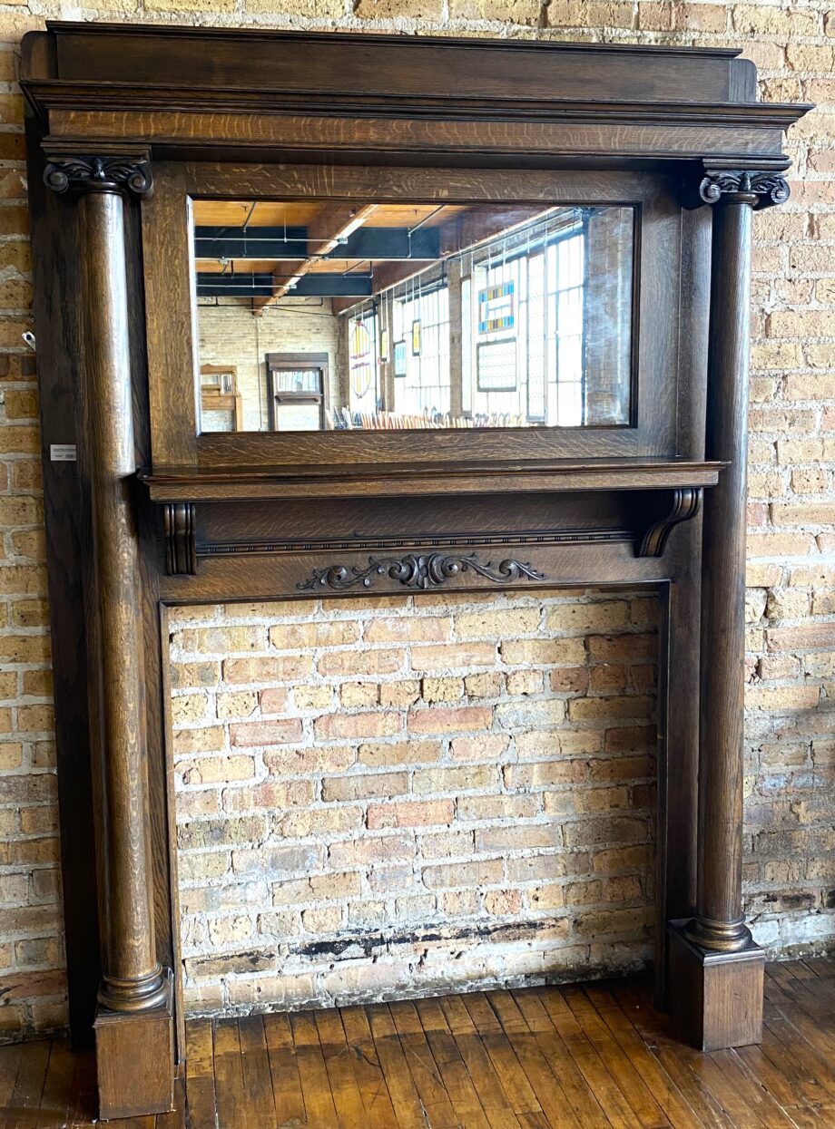 Dark Full Mantel w Ornate Carvings Columns and Mirror