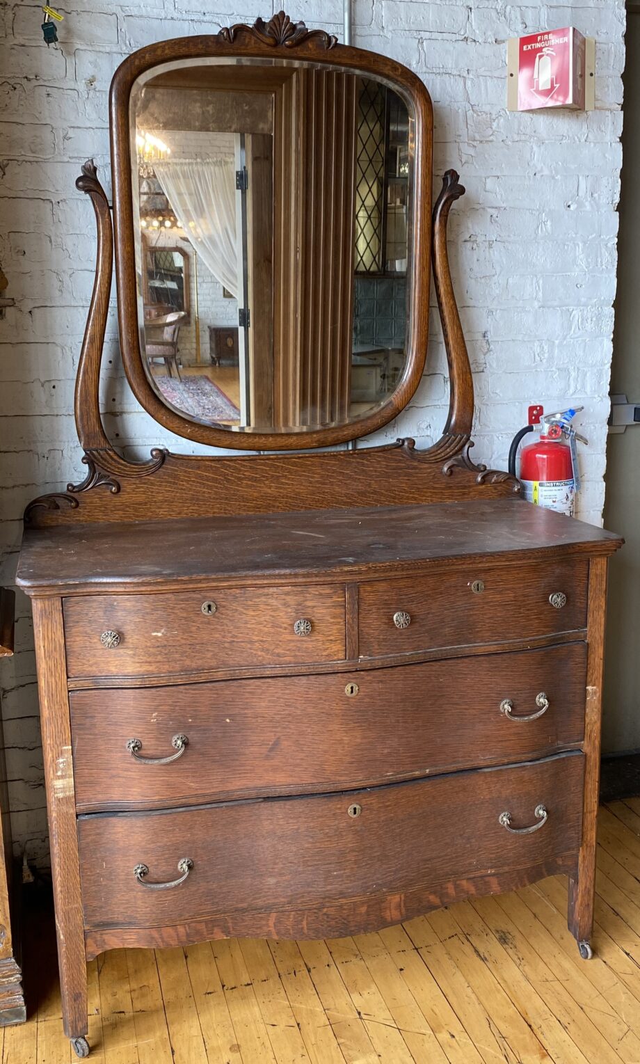 4 Drawer Swinging Mirror Dresser w Carved Details