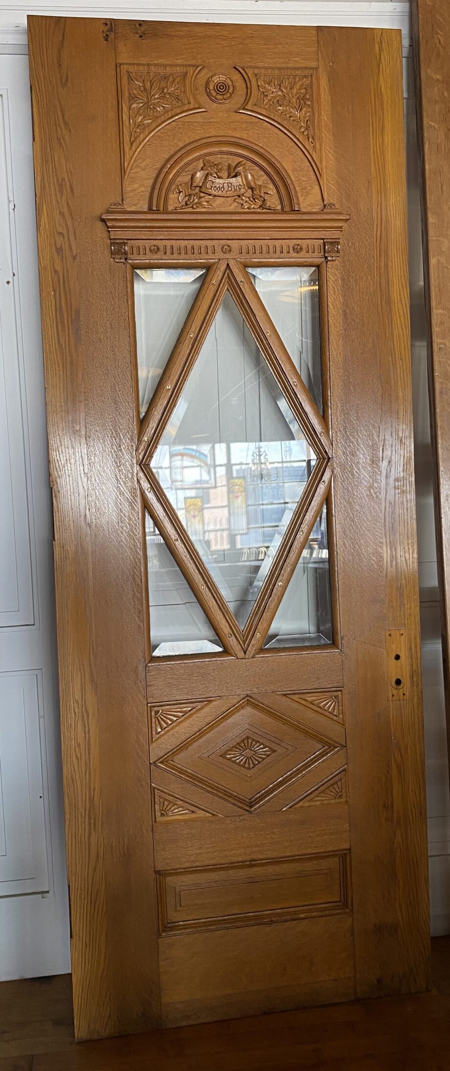 Exterior Door w Carved Accents and Bevel Glass Center