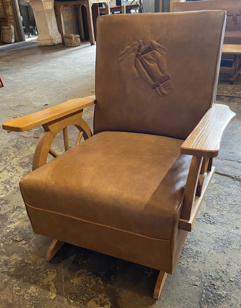 Brown Naugahyde MCM Rocking Chair w Horse Head and Wagon Wheel Arms