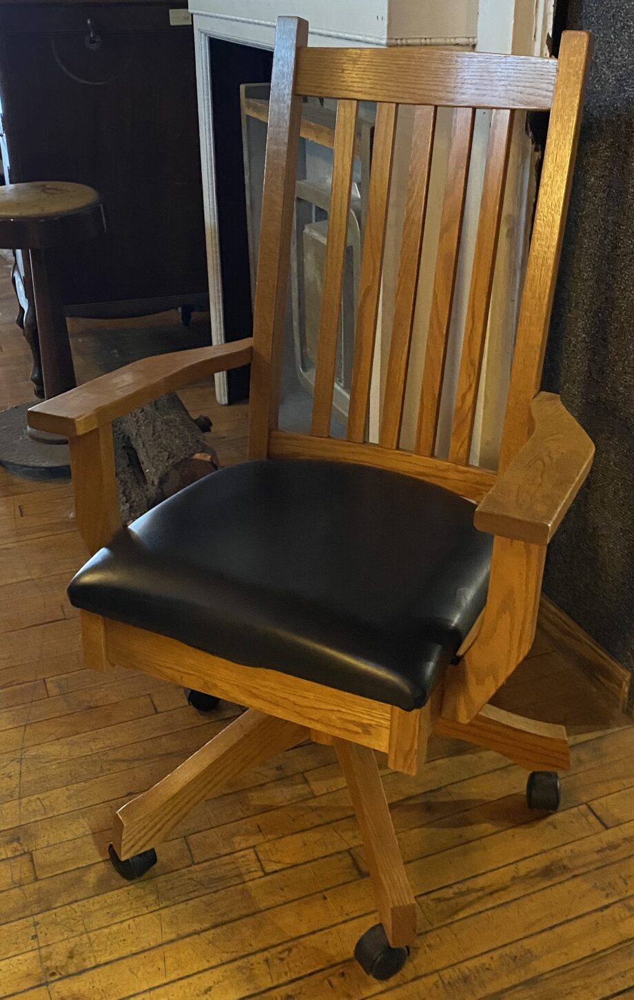 Light Wood and Leather Cushioned Rolling Chair